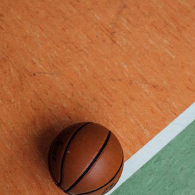 Close up of sports equipment on white floor